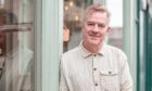 Charlie Connelly stands outside Dundee favourite eating place Pacamara.