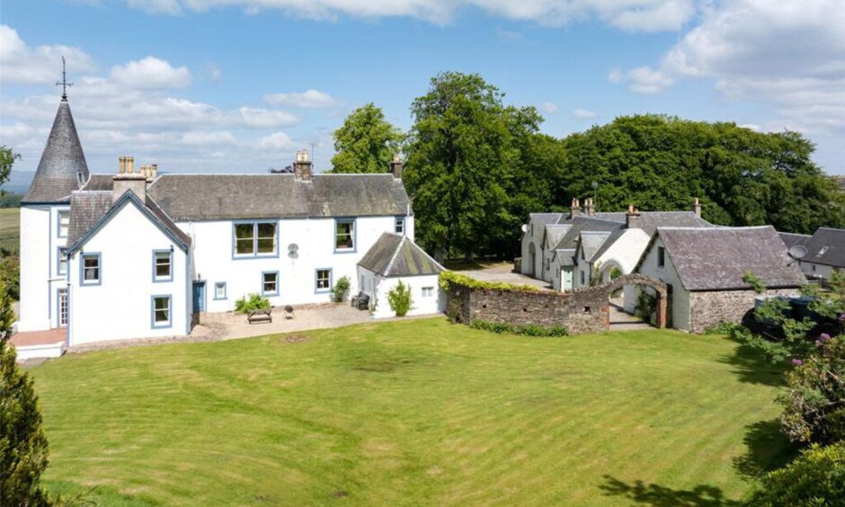 The property is set among attractive gardens.