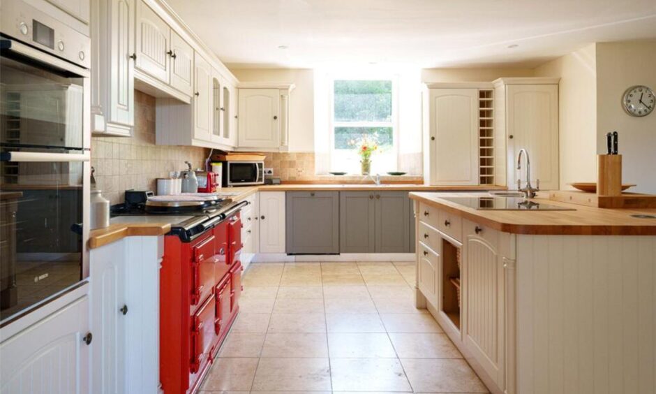 The kitchen features an AGA.