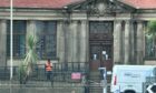 A security guard outside Coldside Library.