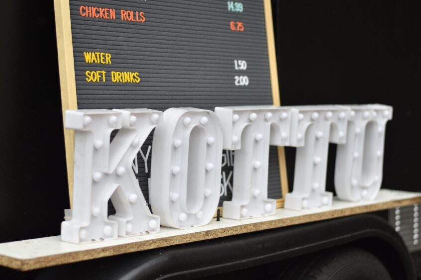 A sign that reads "KOTTU"