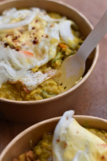 A bowl of kottu and lentil dahl from Truck Sri.