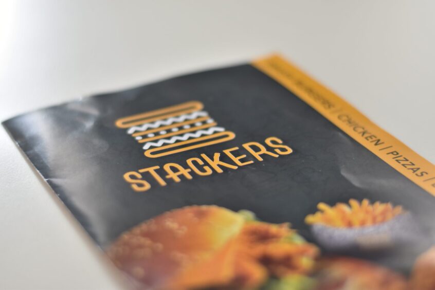 Stackers menu sitting on a table.