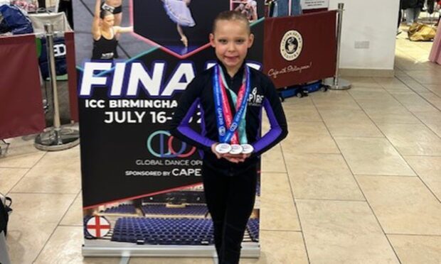 Ella Bloice with her medals at a previous Global Dance Open competition.