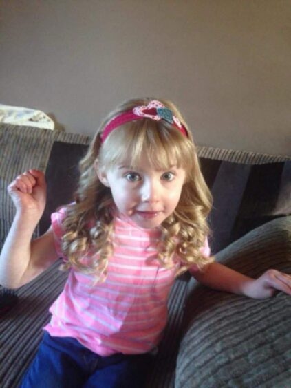 Erin pictured when she was younger.