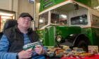 Fife man Ross McGarrie with some of the model buses he has donated to the Dundee Museum of Transport