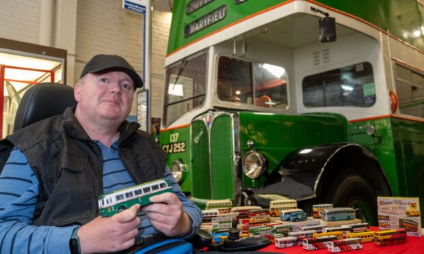 Fife man Ross McGarrie with some of the model buses he has donated to the Dundee Museum of Transport