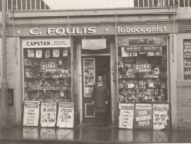 Betty Foulis outside the newsagent. 