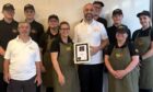 Golden Chip staff members celebrate their Scotland's Business Awards win.