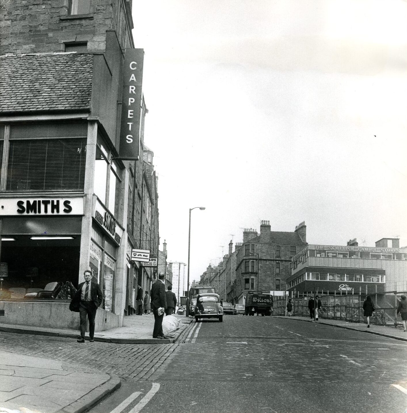people walk by Smith's, which was one of Dundee’s most famous family-run businesses.
