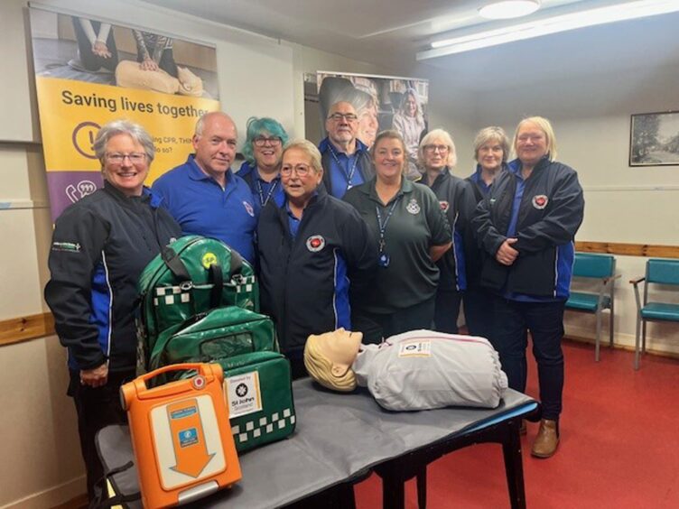Mary and John with their fellow community first responders.