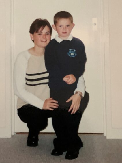  Helen and son Paul when he was at primary school.