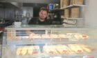 Gökhan Kaya behind the counter at Tattie & Toasted.