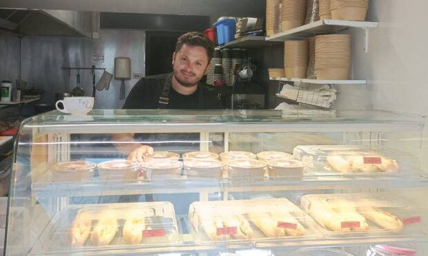 Gökhan Kaya behind the counter at Tattie & Toasted.