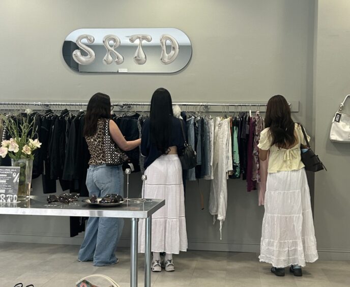 Fashion lovers shopping at SRTD Vintage. Image: Sophie Corbett