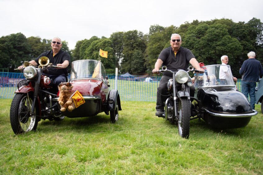 Two men on their BSA A10 Golden Flash motorbikes at the Braco Show.