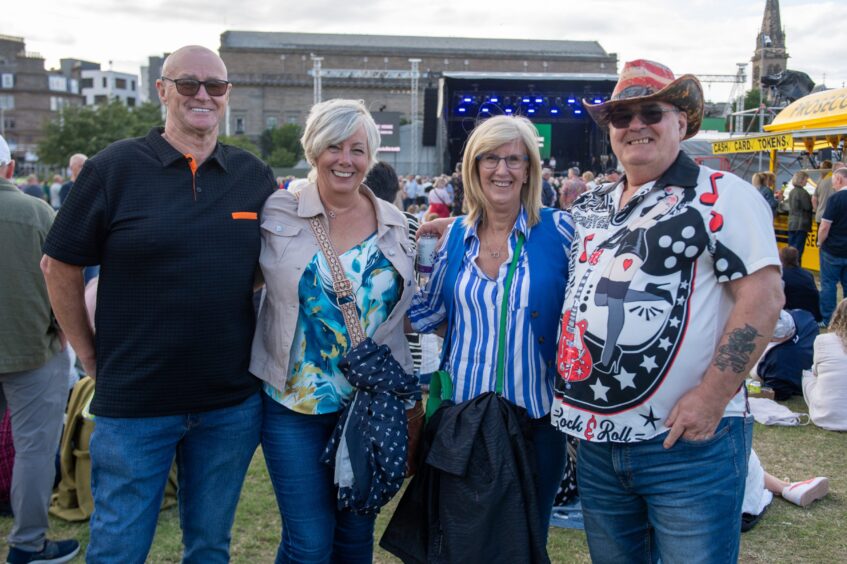 Four happy fans in Dundee to see Tom Jones perform.