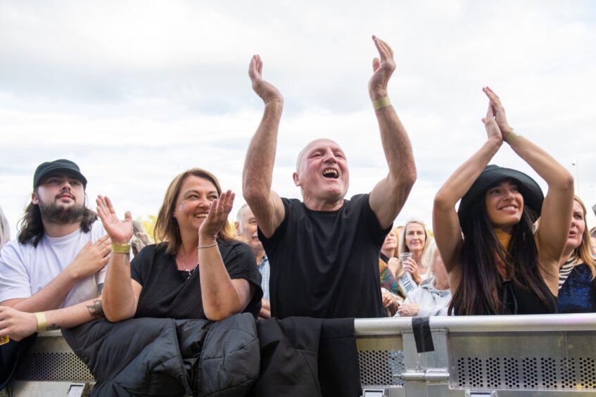 Fans clap to the music in Dundee.