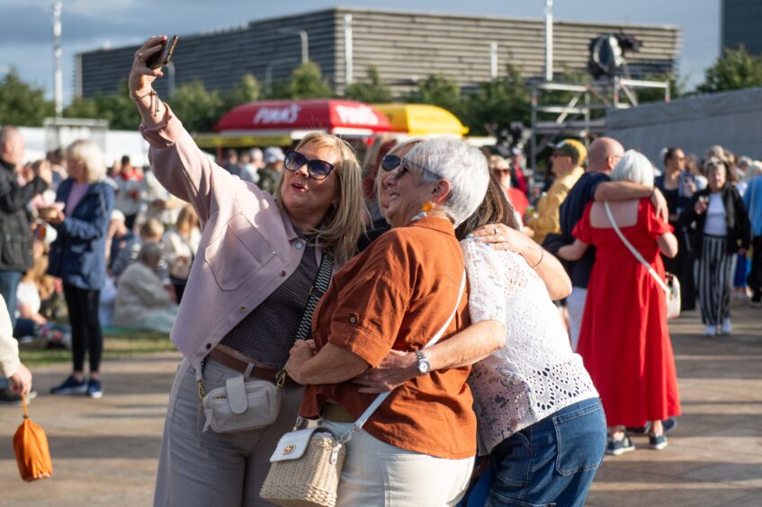 A group of friends take a selfie to remember the Discovery Festival.