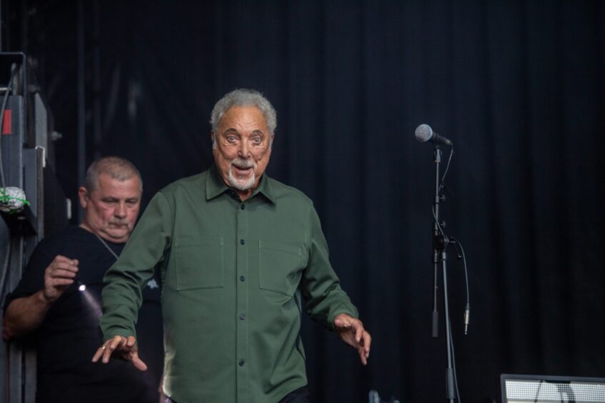 Pop icon Tom Jones heads to the stage at the Discovery Festival in Dundee.