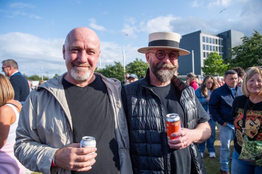 A pair of men enjoying the sun at Dundee Discovery Festival.