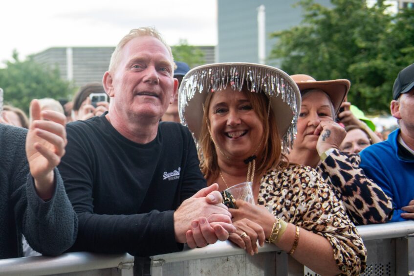 Smiling faces as Tom Jones takes the stage.