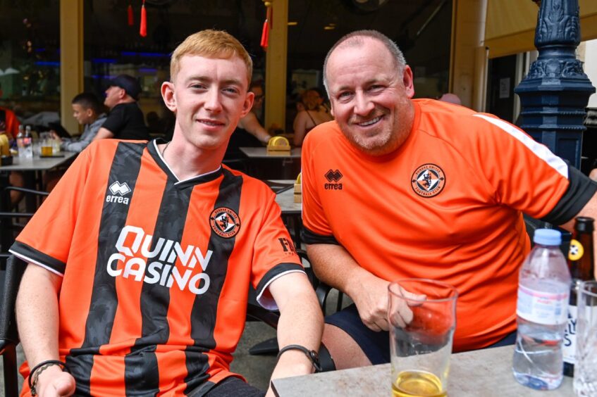 Josh and Graeme Taylor take a refreshment.