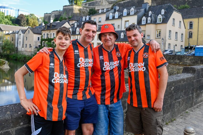 Dundee United fans Frazer, Stuart, Jim and Greg Jamieson make it a family affair in Luxembourg City.
