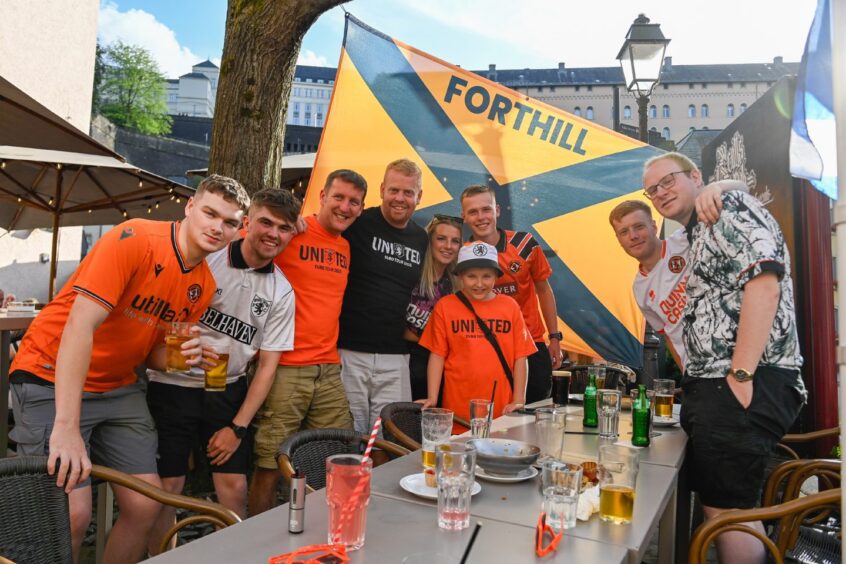 Tangerines supporters enjoying a drink in the Luxembourg sun.