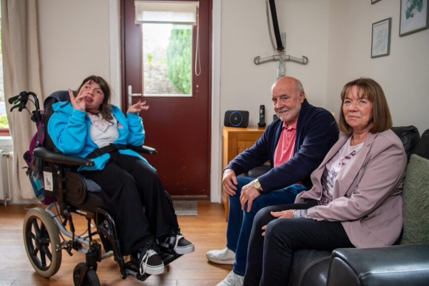 Alex and Christina Thomson with Elaine at her supported accommodation.