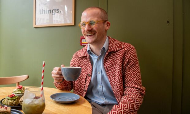 Jacob Smith enjoying Little Things' matcha latte