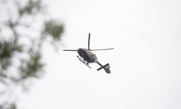 A police helicopter was deployed as part of the search near the Tay Road Bridge.