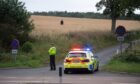 Police at the A92 near Newport.