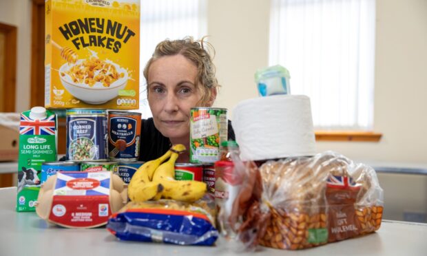 CR0053363, Cheryl Peebles, Burntisland, 5 day Foodbank Challenge. Picture shows; Cheryl is undertaking a 5-day foodbank challenge, living on a typical foodbank parcel. I'm looking for pics of Burntisland and Kinghorn Foodbank chair Katie Cook,
Cheryl with the contents of her food parcel
Friday 23rd May 2025. Image: Kenny Smith/DC Thomson