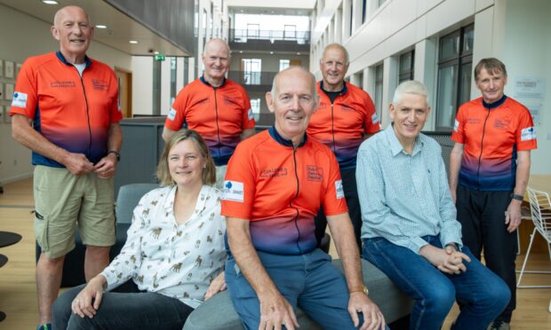 Retired Fife farmer Rob with researchers from Dundee University Dario Alessi and Esther Sammler and some of the other cyclists - Ian Rankin, Ken Lang, Graeme Hogg and John Salisbury.
