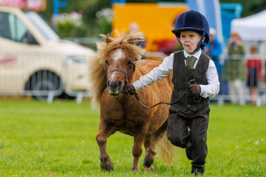 A little boy with his Shetland pony at the Perth Show, 2023. For Perthshire What's On.