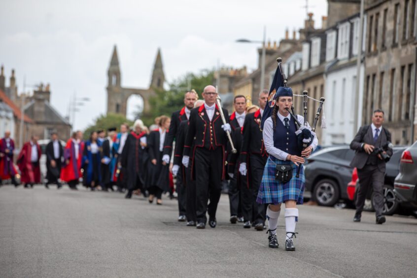 Bagpiper plays at St Andrews University graduations.
