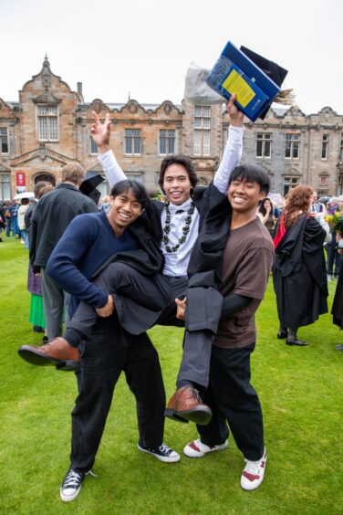Cole Smith Lum from California who studied Classics gets a lift from his cousins Kanin and Nakharin.