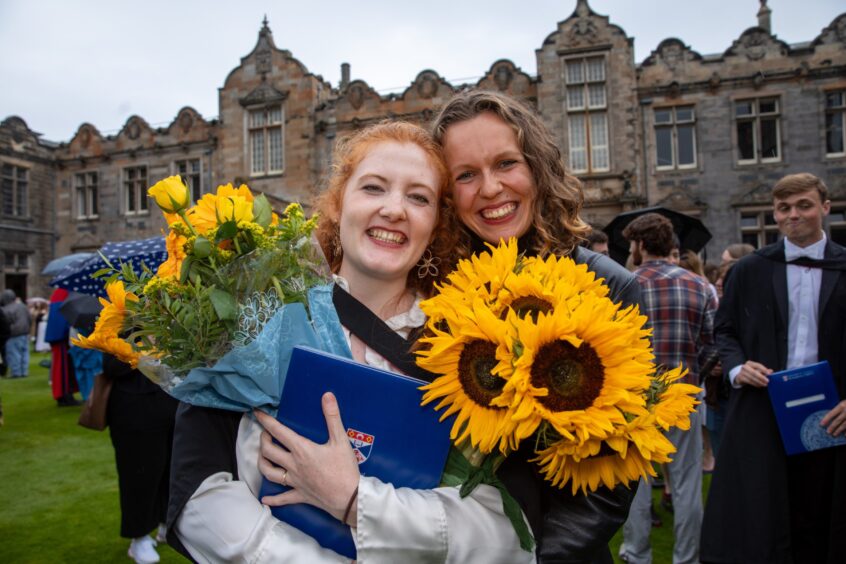 Sunflowers and smiles at the graduations.