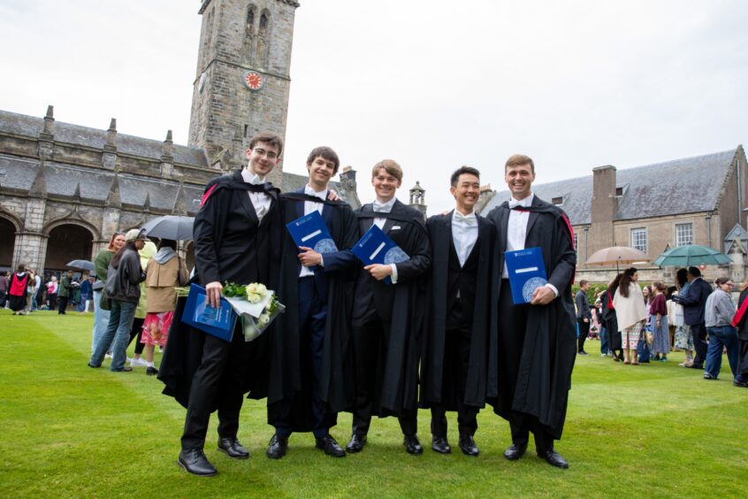 St Andrews University graduates pose for a group photo.