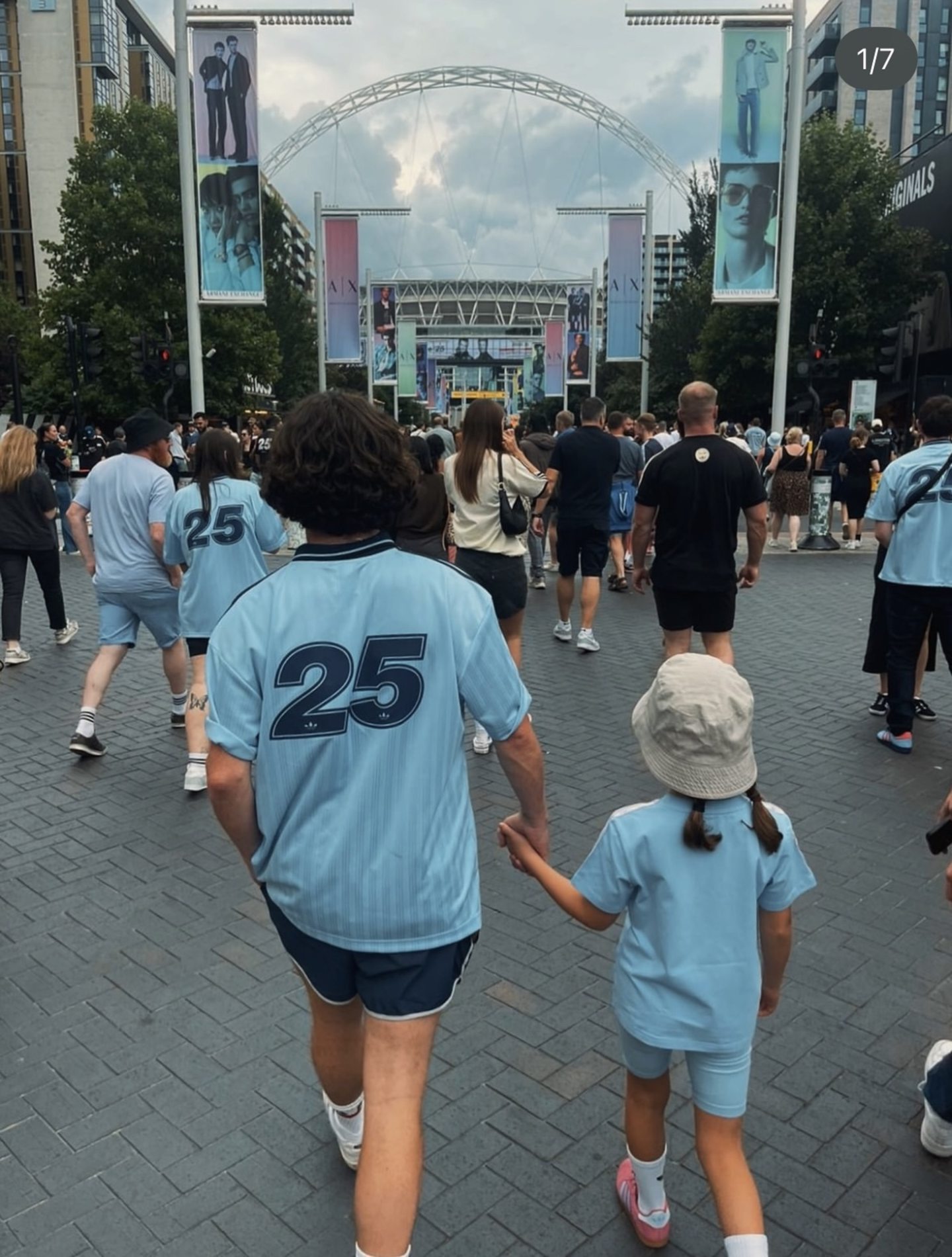 Dundee rocker Kyle Falconer with his daughter at Wembley to watch Oasis.