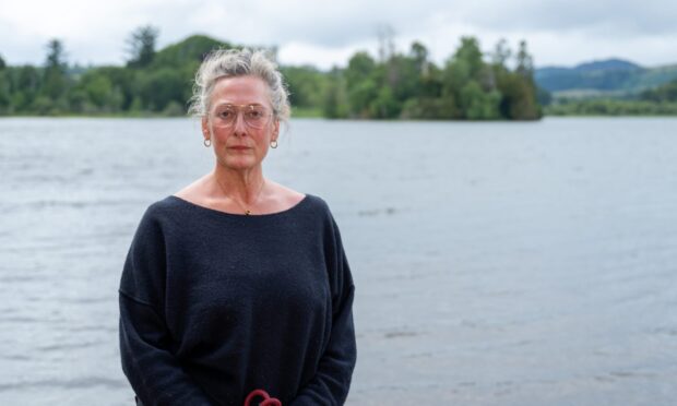 Emily Crichton beside Loch of Clunie