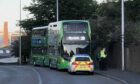Police at an incident on a bus in Lochee Road, Dundee.