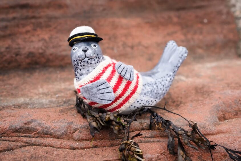 A ceramic Lundie Seal decorated by a local artist for Largo Arts Week. For What's On in Fife in July.