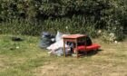 Several piles of rubbish left behind at Riverside Park, Dundee.