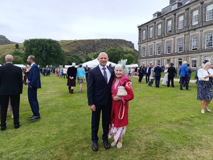 Mary Vowles Duncan and Scott McKenzie Duncan on palace lawn
