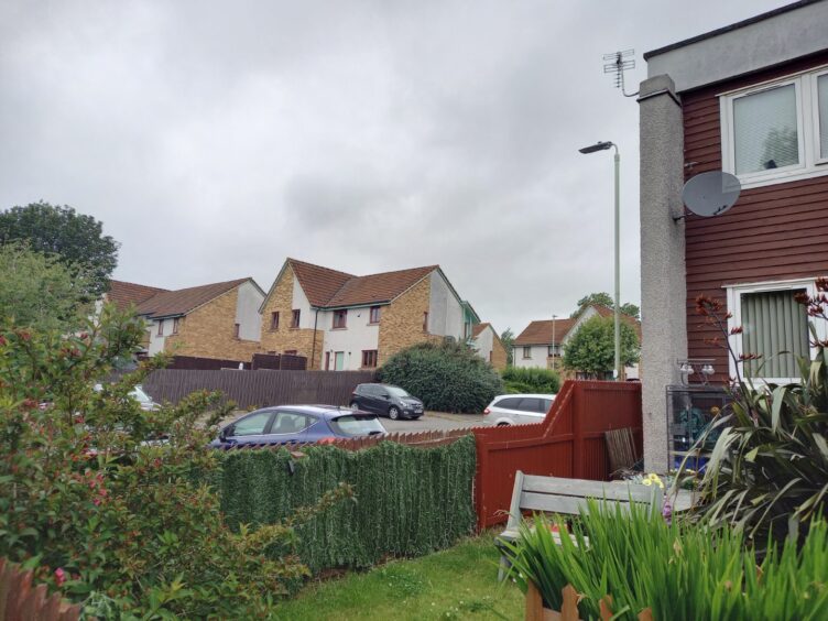 Raac housing on right with newer Raac-free housing in background. 