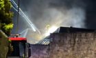 Firefighters tackle the blaze at Caldrum Works in Dundee.