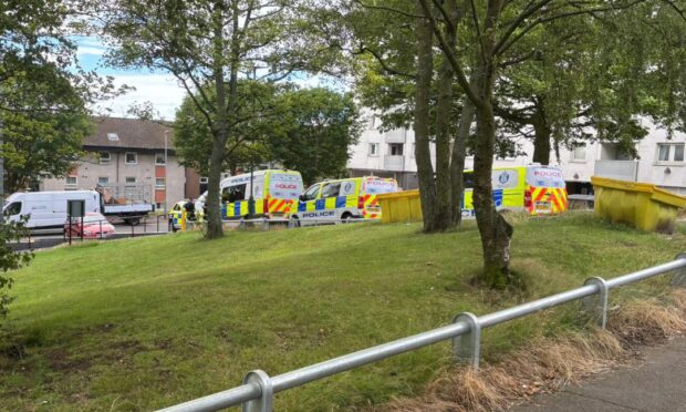 Police at Hilltown Court, Dundee.