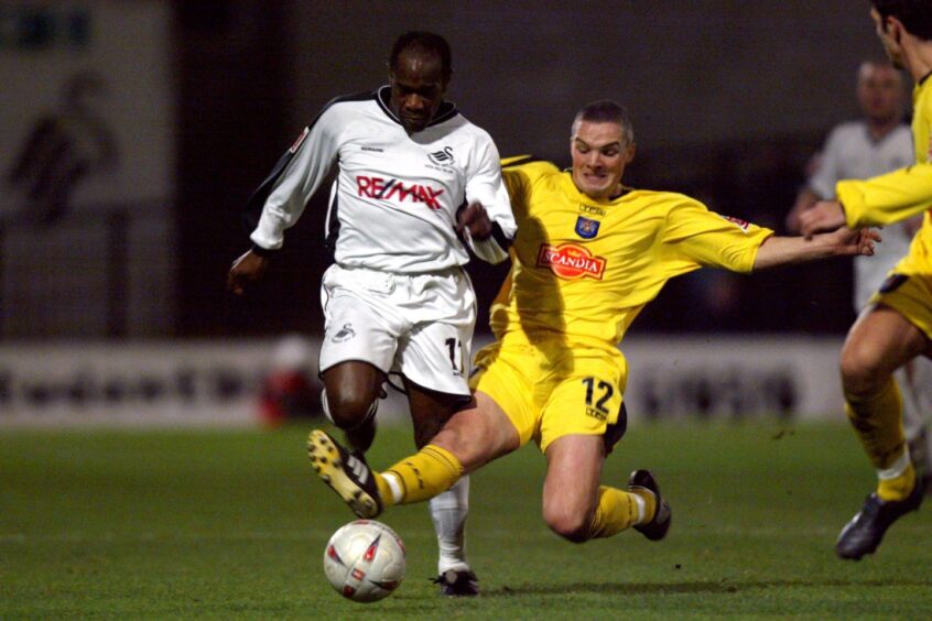 Jim Goodwin, right, in action for Stockport County